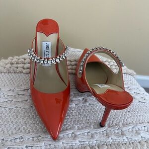 Orange high heel mules